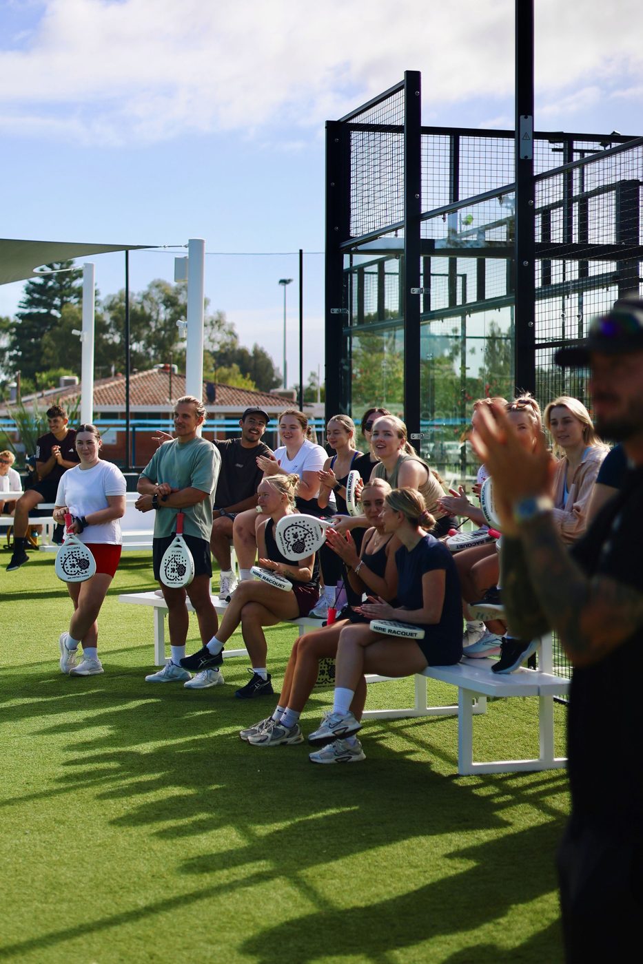 Padel social crowd courtside